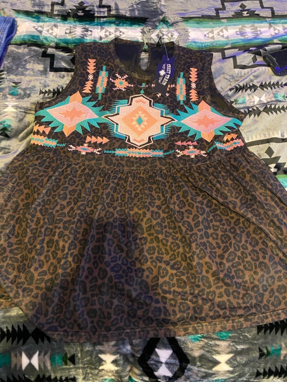 Crazy Train Embroidered Peplum Top